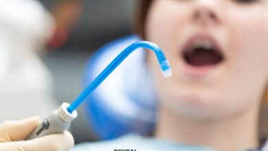 What are the functions and types of dental suction devices?